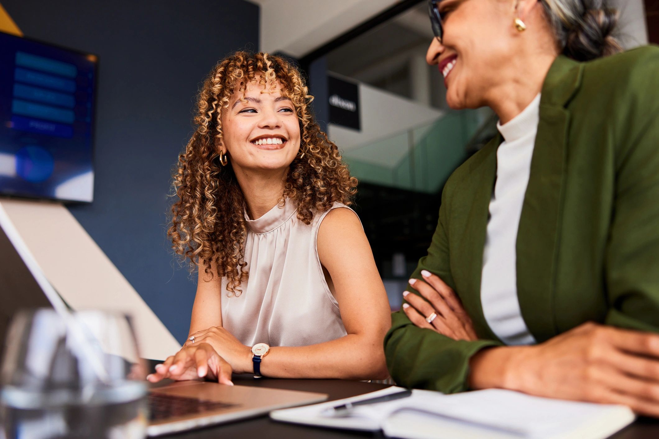 Executive coaching conversation in a professional workplace